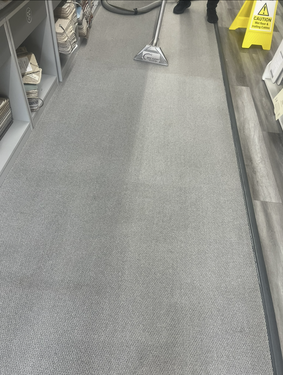 Cleaned grey carpet in a home by Epic Clean