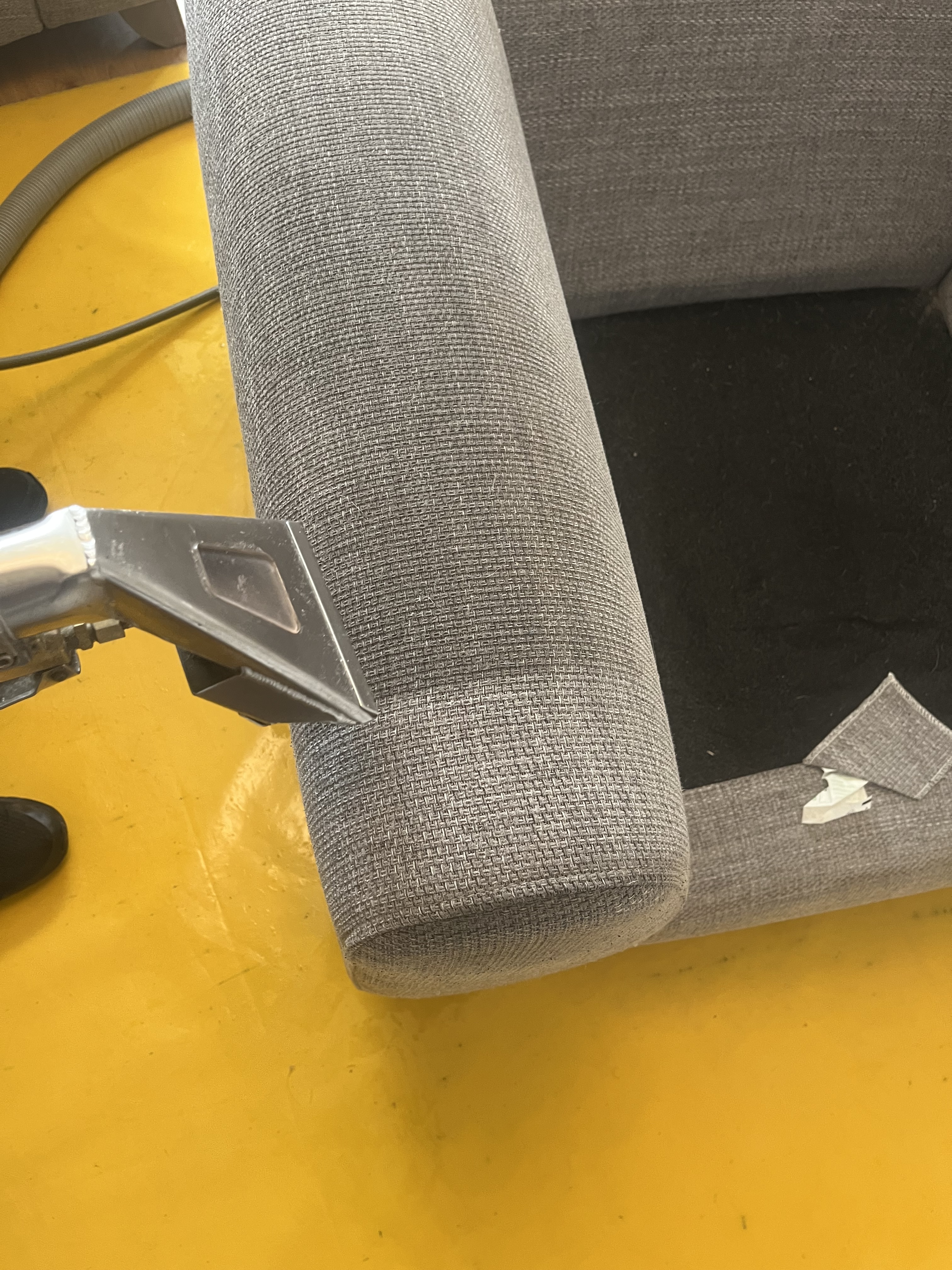 Professional upholstery cleaning on a fabric chair